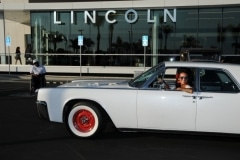 Amber driving '62 Lincoln